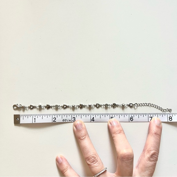 Silver Tone and Costume Jewelry Bracelet with Solid and Open Hearts and Crystal - Picture 2 of 3